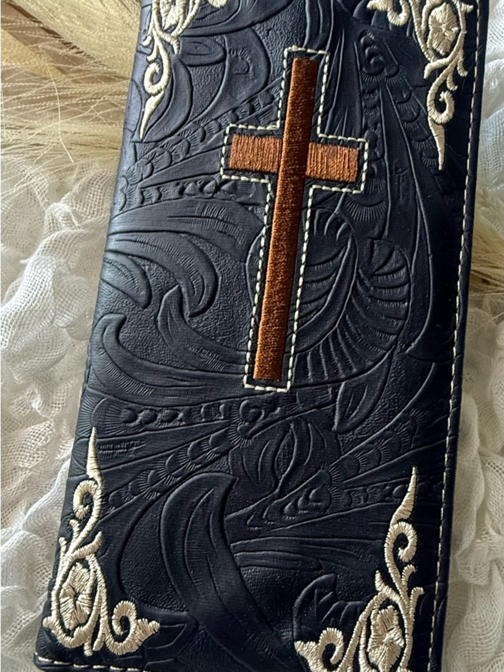 Men's Embossed Black Leather Wallet with Brown Cross Accent